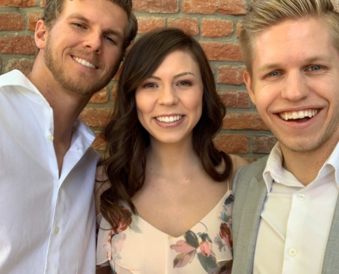 A Woman With Two Men in Formals