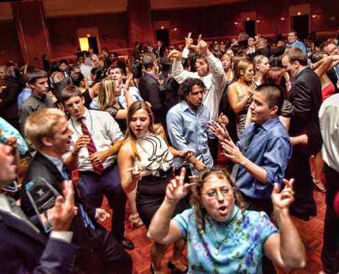 A Group Dancing With Partners on the Stage