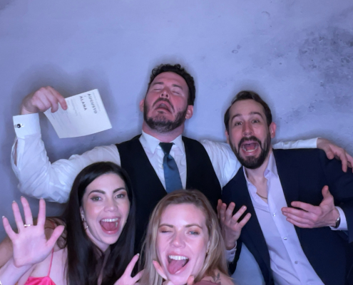 Two Men and Two Women in a Photobooth Image