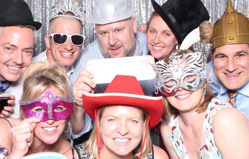 A Group of People With Fancy Party Hats