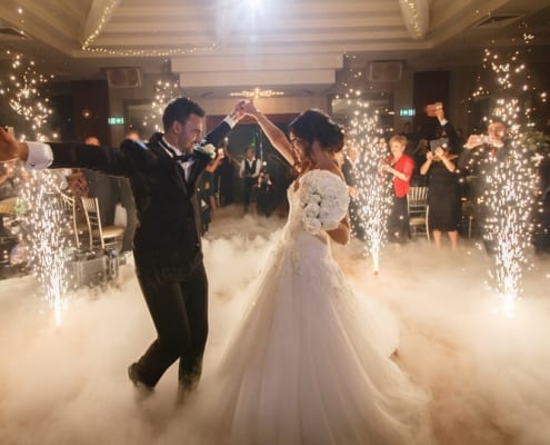 A Bride and Groom With Firewords and Smoke Floor