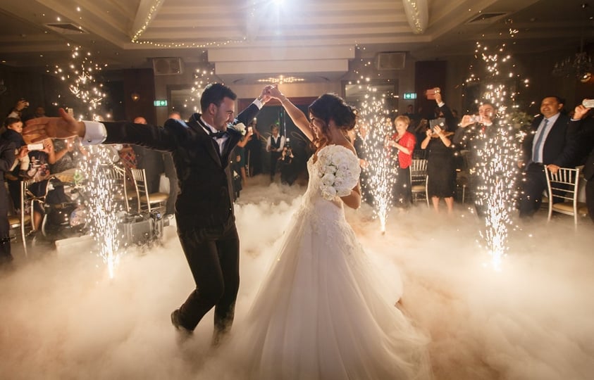 A Bride and Groom With Firewords and Smoke Floor