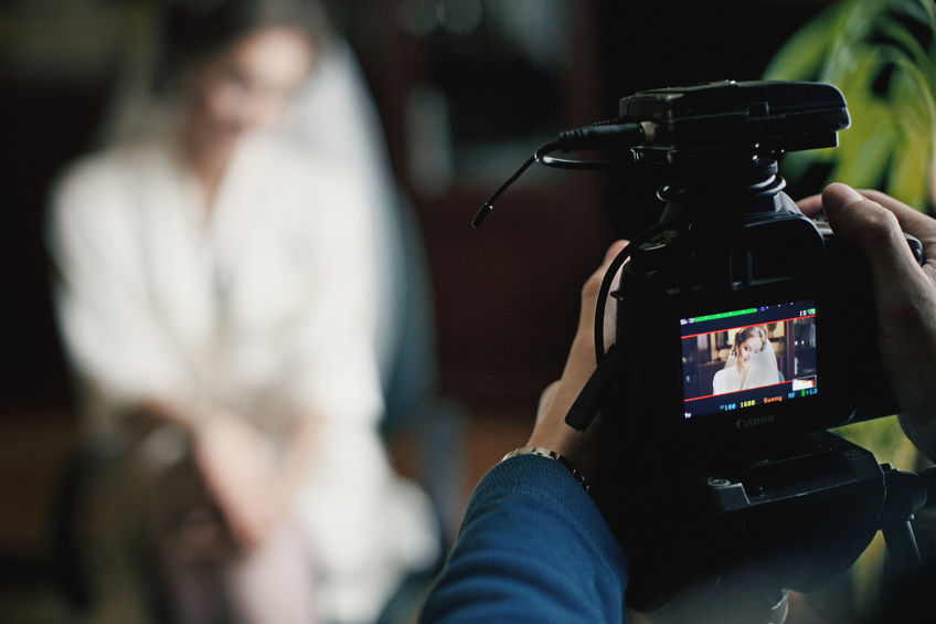 A Camera Capturing an Image of a Bride